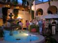Chapter Presidents and Executive Officers enjoy the Best Western Headquarters courtyard at dusk.
